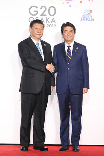 習近平、安倍前首相