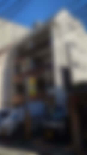 土地の所有者「G社」の入る雑居ビル